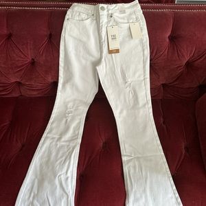 New with Tags- 73% Cotton YMI High Rise Flare Jeans. 
Size 7/28.